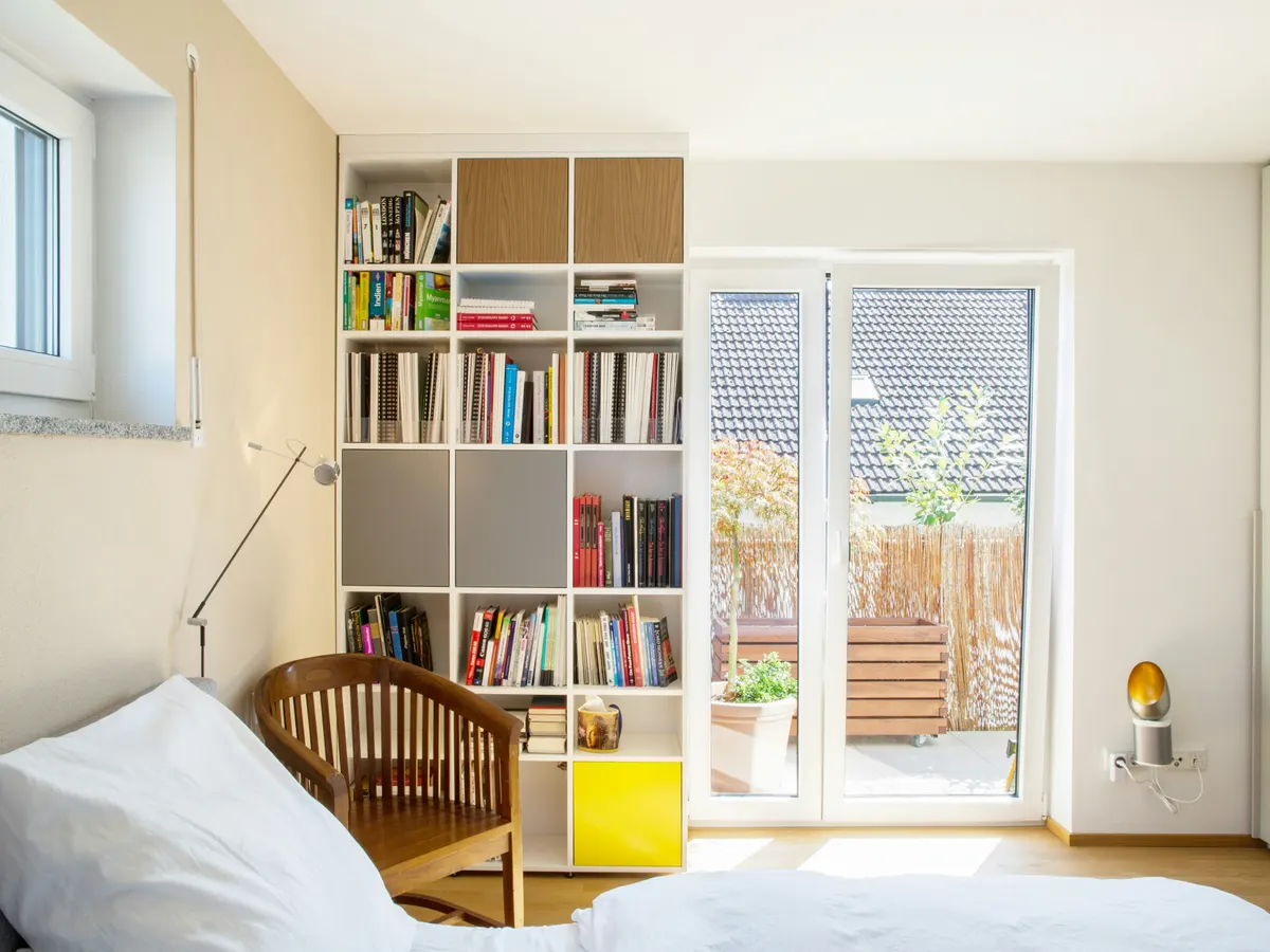 Bright, efficient mudroom with custom shelving compartments for easy access.